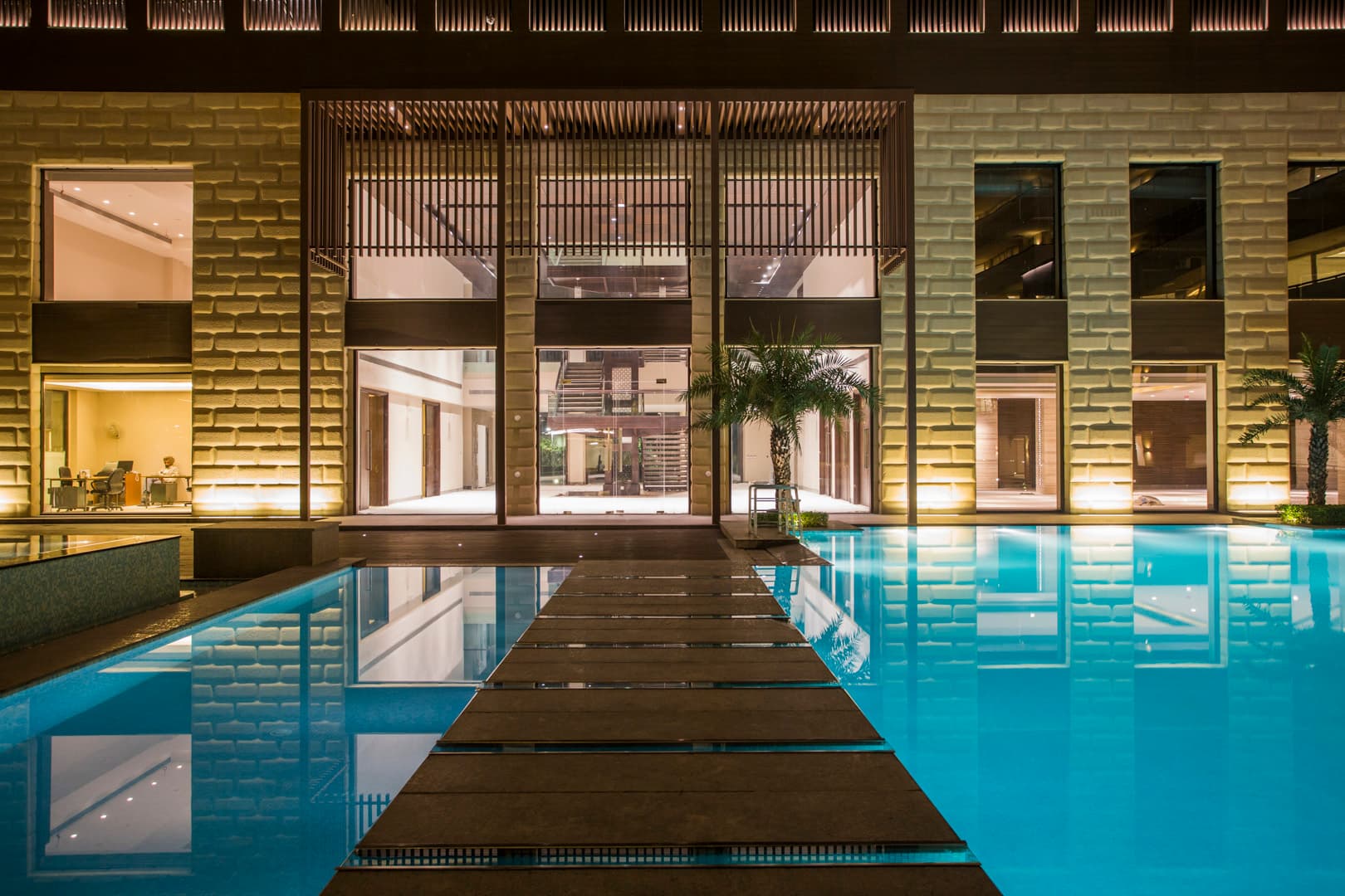 The Verandas clubhouse and pool at night